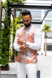 Made by Saffron Lane, modern Indian menswear, Indo western men's clothing. Multi-color printed linen-poly blend nehru vest. Perfect for Indian wedding celebrations, wear to a Mehndi or Sangeet party