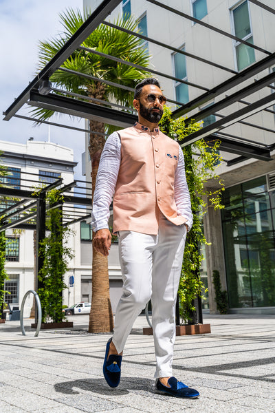 Made by Saffron Lane, modern Indian menswear, Indo western men's clothing. Peach silk blend nehru vest. Perfect for Indian wedding, Mehndi, or Sangeet party